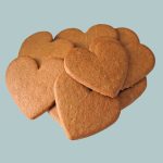 Travel Women Eats Cookies In Nature